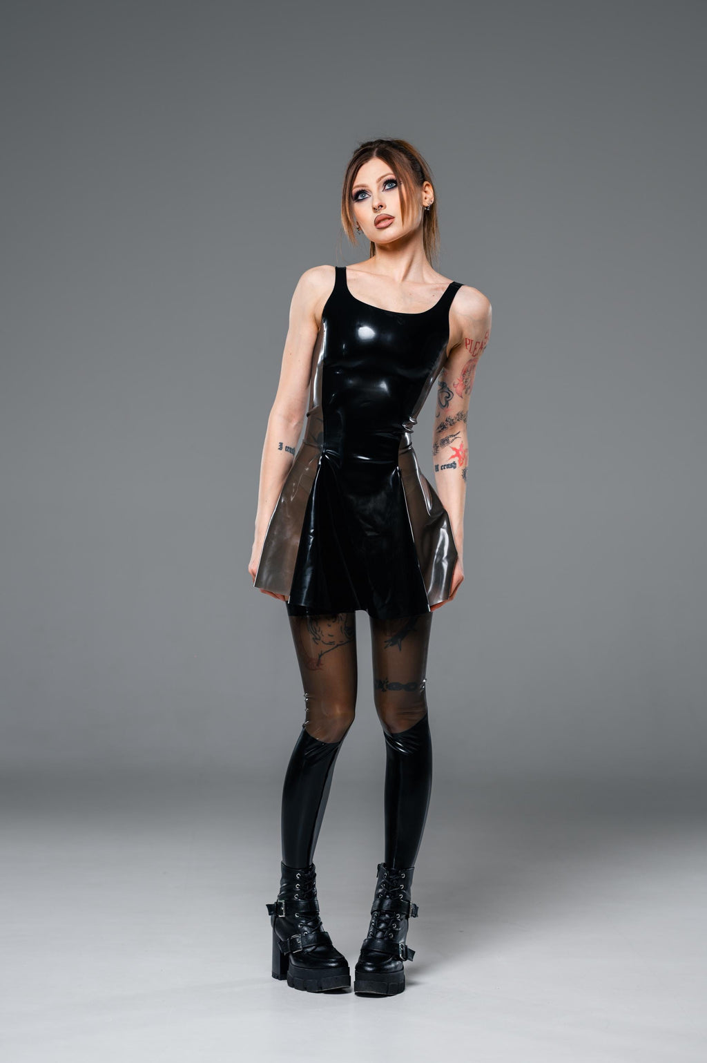 Black latex dress with translucent side panel, detail
