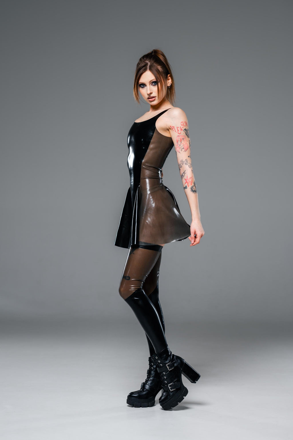 Black and translucent latex skater dress, full length view